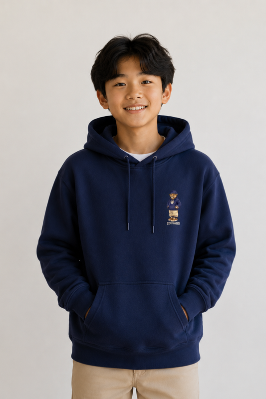 Child wearing a navy blue hoodie with a logo on a light gray background